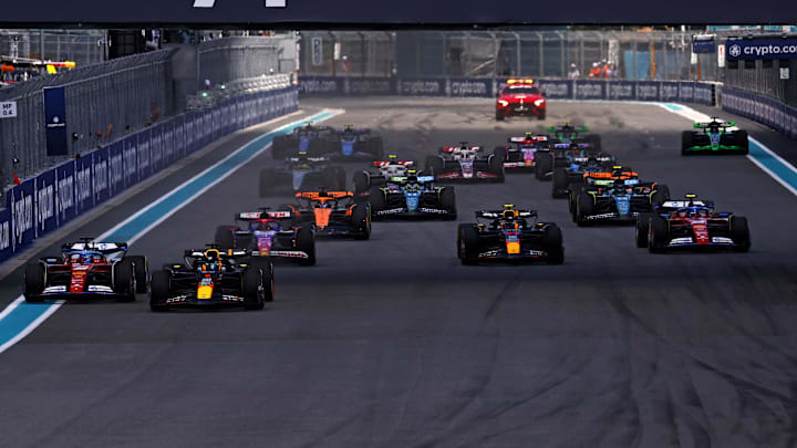 May 4, 2024; Miami Gardens, Florida, USA; Red Bull Racing driver Max Verstappen (1) leads the start of the F1 Sprint Race at Miami International Autodrome. Mandatory Credit: Peter Casey-Imagn Images