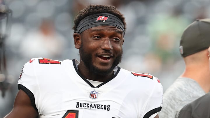 Aug 19, 2023; East Rutherford, New Jersey, USA; Tampa Bay Buccaneers wide receiver Chris Godwin (14) before the game against the New York Jets at MetLife Stadium. Mandatory Credit: Vincent Carchietta-Imagn Images