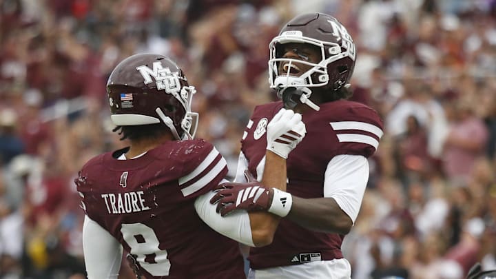 Mississippi State Bulldogs tight end Seydou Traore (8) and wide receiver Jordan Mosley (4) react during the second quarter against the Texas Longhorns at Davis Wade Stadium at Scott Field.
