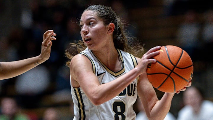 Purdue Freshman Hila Karsh (8) looks for a pass during an NCAA women’s basketball game 