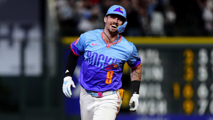 Aug 1, 2025; Denver, Colorado, USA; Colorado Rockies center fielder Brenton Doyle (9) celebrates his two run walk off home run in the ninth inning against the Pittsburgh Pirates at Coors Field. Mandatory Credit: Ron Chenoy-Imagn Images Aug 1, 2025; Denver, Colorado, USA; Colorado Rockies center fielder Brenton Doyle (9) celebrates his two run walk off home run in the ninth inning against the Pittsburgh Pirates at Coors Field. Mandatory Credit: Ron Chenoy-Imagn Images