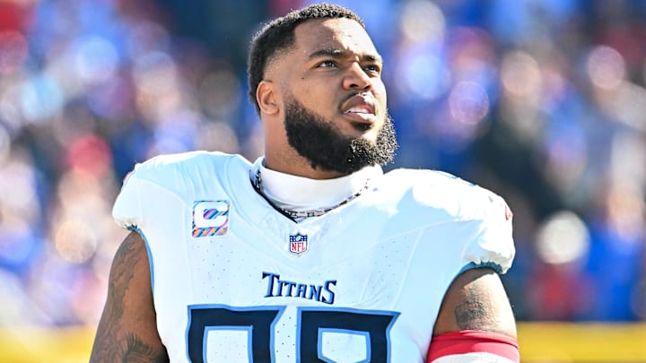 Oct 20, 2024; Orchard Park, New York, USA; Tennessee Titans defensive tackle Jeffery Simmons (98) looks to the scoreboard in the second quarter game against the Buffalo Bills at Highmark Stadium. Mandatory Credit: Mark Konezny-Imagn Images Oct 20, 2024; Orchard Park, New York, USA; Tennessee Titans defensive tackle Jeffery Simmons (98) looks to the scoreboard in the second quarter game against the Buffalo Bills at Highmark Stadium. Mandatory Credit: Mark Konezny-Imagn Images