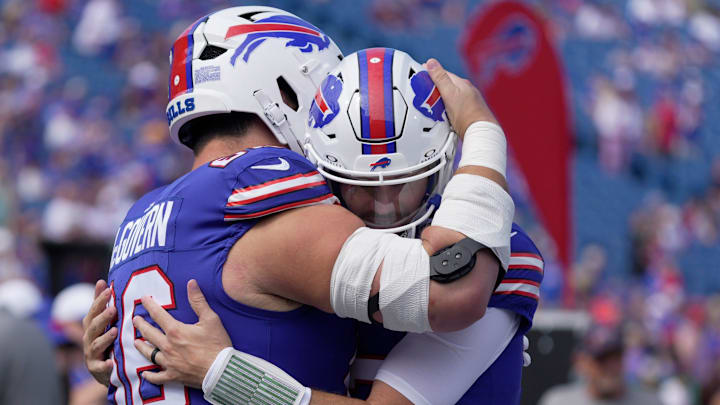 Buffalo Bills center Connor McGovern hugs quarterback Josh Allen as teammates greet each other during team warm up before the Bills home game against the New Orleans Saints in Orchard Park on Sept. 28, 2025. Buffalo Bills center Connor McGovern hugs quarterback Josh Allen as teammates greet each other during team warm up before the Bills home game against the New Orleans Saints in Orchard Park on Sept. 28, 2025.