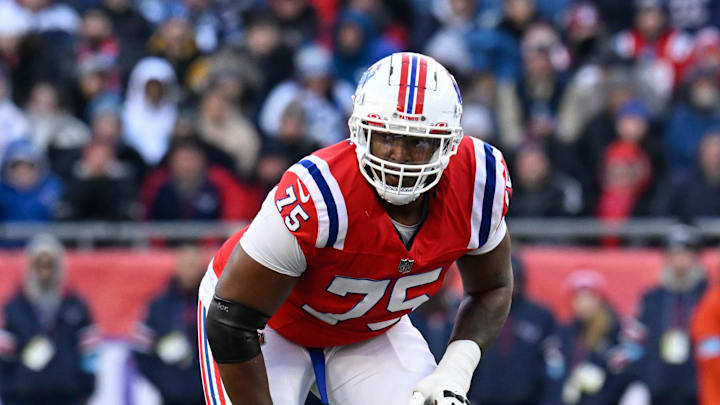 Dec 1, 2024; Foxborough, Massachusetts, USA; New England Patriots offensive tackle Demontrey Jacobs (75) on the line of scrimmage before the snap of the ball during the second half against the Indianapolis Colts at Gillette Stadium. Mandatory Credit: Eric Canha-Imagn Images Dec 1, 2024; Foxborough, Massachusetts, USA; New England Patriots offensive tackle Demontrey Jacobs (75) on the line of scrimmage before the snap of the ball during the second half against the Indianapolis Colts at Gillette Stadium. Mandatory Credit: Eric Canha-Imagn Images
