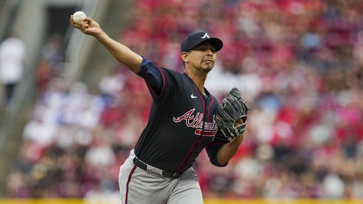 Jul 31, 2025; Cincinnati, OH, USA; Atlanta Braves pitcher Carlos Carrasco (59) throws against the Cincinnati Reds in the first inning at Great American Ball Park. Mandatory Credit: Aaron Doster-Imagn Images
