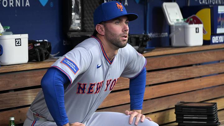 Apr 13, 2026; Los Angeles, California, USA;  New York Mets pitcher David Peterson (23) in the dugout prior to the game against the Los Angeles Dodgers at Dodger Stadium. Mandatory Credit: Jayne Kamin-Oncea-Imagn Images