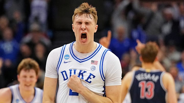 Mar 27, 2025; Newark, NJ, USA; Duke Blue Devils forward Cooper Flagg (2) reacts after making a last second shot to end the first half against the Arizona Wildcats during an East Regional semifinal of the 2025 NCAA tournament at Prudential Center. Mandatory Credit: Robert Deutsch-Imagn Images