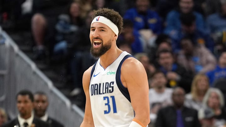 Dec 15, 2024; San Francisco, California, USA; Dallas Mavericks guard Klay Thompson (31) reacts after making a three point basket against the Golden State Warriors during the fourth quarter at Chase Center. Mandatory Credit: Darren Yamashita-Imagn Images