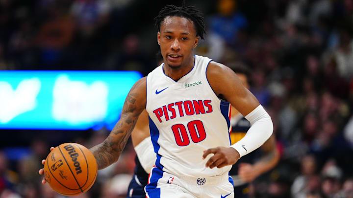 Dec 28, 2024; Denver, Colorado, USA; Detroit Pistons forward Ronald Holland II (00) dribbles up court in the second half against the Denver Nuggets at Ball Arena. Mandatory Credit: Ron Chenoy-Imagn Images