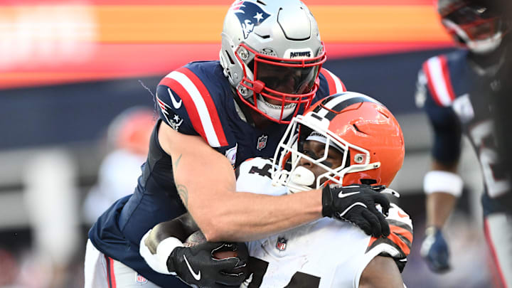 Oct 26, 2025; Foxborough, Massachusetts, USA;  New England Patriots linebacker Robert Spillane (14) tackles Cleveland Browns tight end Harold Fannin Jr. (44) during the fourth quarter at Gillette Stadium.
