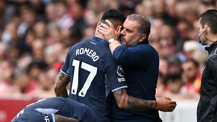 Ange Postecoglou consoles Cristian Romero after his early substitution