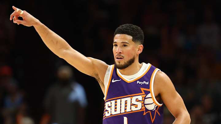 Mar 24, 2026; Phoenix, Arizona, USA; Phoenix Suns guard Devin Booker (1) reacts against the Denver Nuggets in the second half at Mortgage Matchup Center. Mandatory Credit: Mark J. Rebilas-Imagn Images Mar 24, 2026; Phoenix, Arizona, USA; Phoenix Suns guard Devin Booker (1) reacts against the Denver Nuggets in the second half at Mortgage Matchup Center. Mandatory Credit: Mark J. Rebilas-Imagn Images