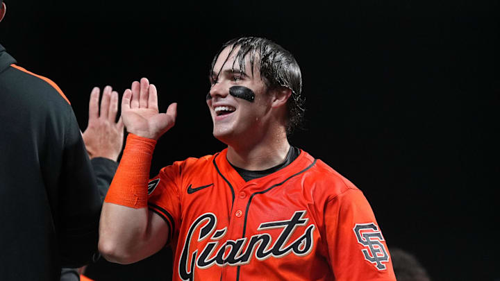 Sep 12, 2025; San Francisco, California, USA; San Francisco Giants right fielder Drew Gilbert (61) celebrates after defeating the Los Angeles Dodgers at Oracle Park. Mandatory Credit: Darren Yamashita-Imagn Images