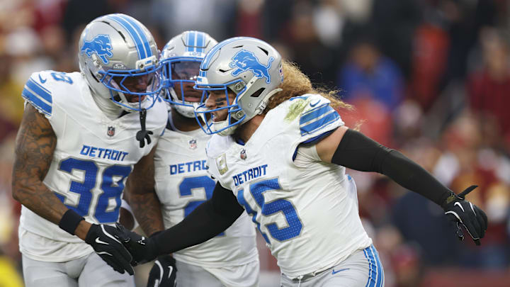 Detroit Lions linebacker Grant Stuard (15) celebrates with teammates after a stop on the kickoff 