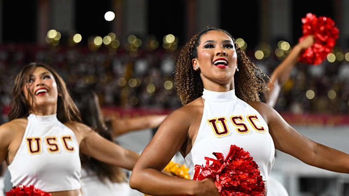 Sep 7, 2024; Los Angeles, California, USA; USC Trojan cheerleaders dance in the game against the Utah State Aggies during the first quarter at United Airlines Field at Los Angeles Memorial Coliseum.
