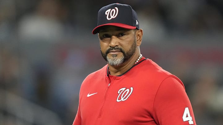 Apr 1, 2025; Toronto, Ontario, CAN; Washington Nationals manager Dave Martinez (4) walks back to the dugout after visiting the pitcher’s mound during the eighth inning against the Toronto Blue Jays at Rogers Centre