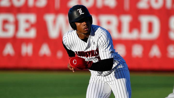 Louisville catcher Zion Rose (32) breaks for third during the first inning of their game against Kentucky, Tuesday, April 8 2025 in Louisville Ky. Louisville catcher Zion Rose (32) breaks for third during the first inning of their game against Kentucky, Tuesday, April 8 2025 in Louisville Ky.