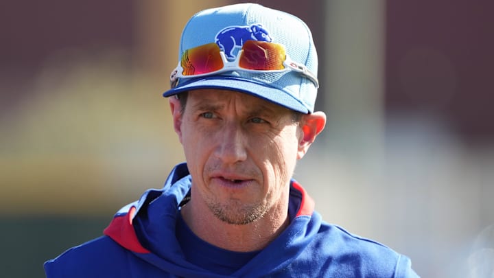 Feb 10, 2025; Mesa, AZ, USA; Chicago Cubs manager Craig Counsell (11) watches players warm up during spring training camp.