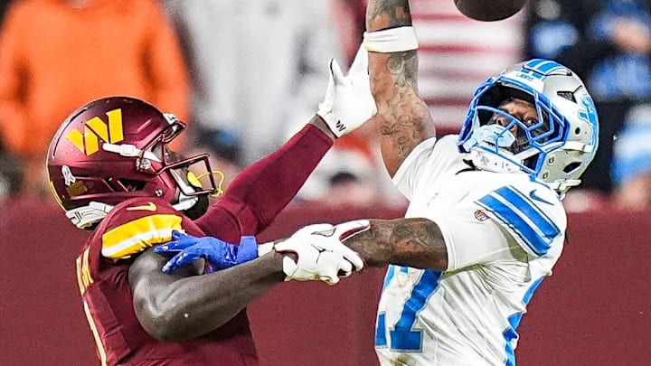 Washington Commanders wide receiver Deebo Samuel (1) makes a catch against Detroit Lions cornerback Arthur Maulet (27).