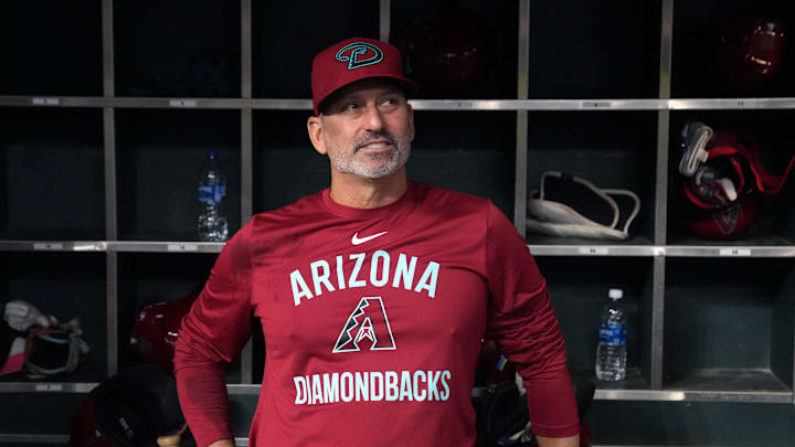 Aug 20, 2025; Phoenix, Arizona, USA; Arizona Diamondbacks manager Torey Lovullo (17) sits in the dugout after defeating the Cleveland Guardians at Chase Field. Mandatory Credit: Rick Scuteri-Imagn Images