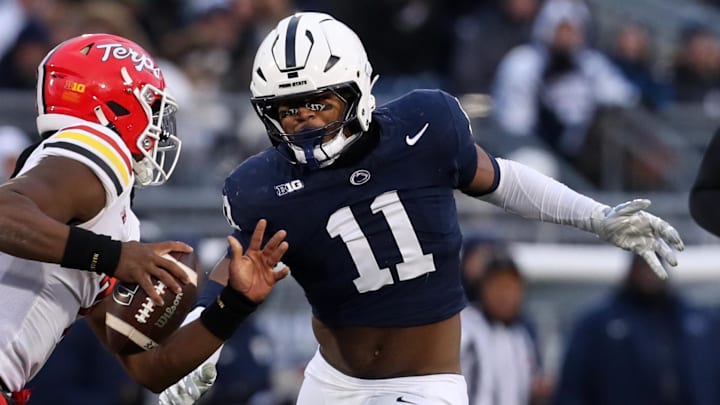 Nov 30, 2024; University Park, Pennsylvania, USA; (Editors Notes: Caption Correction) Penn State Nittany Lions defensive end Abdul Carter (11) pressures Maryland Terrapins quarterback MJ Morris (7) during the first quarter at Beaver Stadium. Mandatory Credit: Matthew O'Haren-Imagn Images