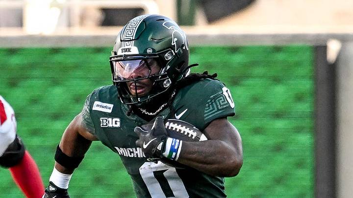 Michigan State’s Cam Edwards runs for a gain against Nebraska during the first quarter on Saturday, Sept. 26, 2026, in East Lansing.