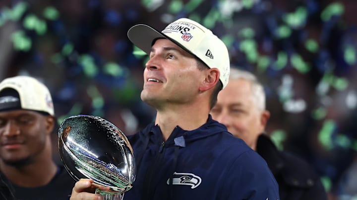 Seattle Seahawks head coach Mike Macdonald celebrates with the Vince Lombardi trophy