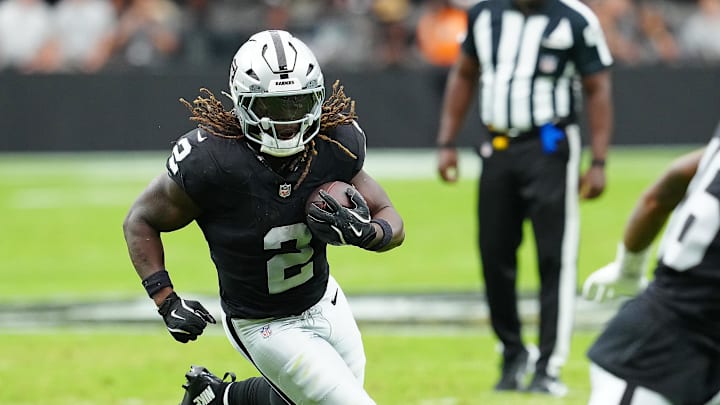 Aug 16, 2025; Paradise, Nevada, USA; Raiders running back Ashton Jeanty (2) rushes against the San Francisco 49ers during the first quarter at Allegiant Stadium. Mandatory Credit: Stephen R. Sylvanie-Imagn Images