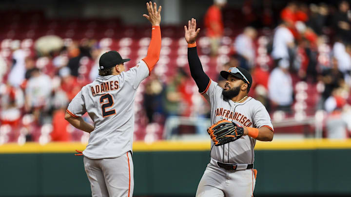 Mar 30, 2025; Cincinnati, Ohio, USA; San Francisco Giants outfielder Heliot Ramos (17) high fives shortstop Willy Adames (2) after the victory over the Cincinnati Reds at Great American Ball Park. Mar 30, 2025; Cincinnati, Ohio, USA; San Francisco Giants outfielder Heliot Ramos (17) high fives shortstop Willy Adames (2) after the victory over the Cincinnati Reds at Great American Ball Park.