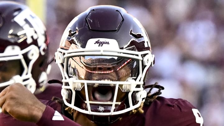 Texas A&M Aggies defensive end Cashius Howell reacts after a sack