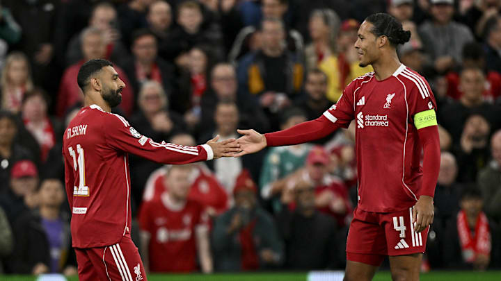 Virgil van Dijk (right) defended Mohamed Salah from criticism.
