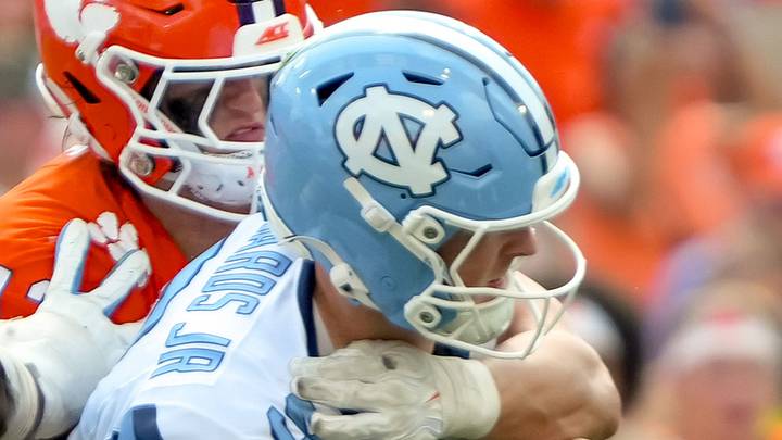 Clemson defensive end Will Heldt (13) sacks University of North Carolina quarterback Billy Edwards Jr. (9) during the third quarter at Memorial Stadium in Clemson, S.C. Saturday, September 19, 2026. Clemson defensive end Will Heldt (13) sacks University of North Carolina quarterback Billy Edwards Jr. (9) during the third quarter at Memorial Stadium in Clemson, S.C. Saturday, September 19, 2026.
