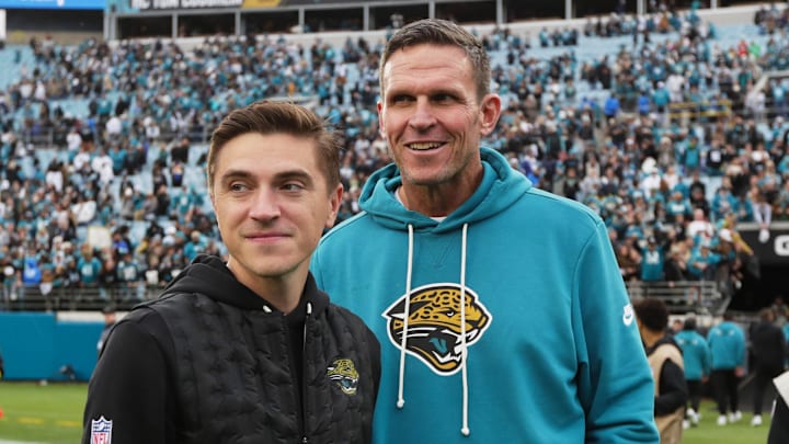 Jan 4, 2026; Jacksonville, Florida, USA; Jacksonville Jaguars general manager James Gladstone (left) and executive vice president of football operations Tony Boselli stand on the field after the game against the Tennessee Titans at EverBank Stadium. Mandatory Credit: Travis Register-Imagn Images