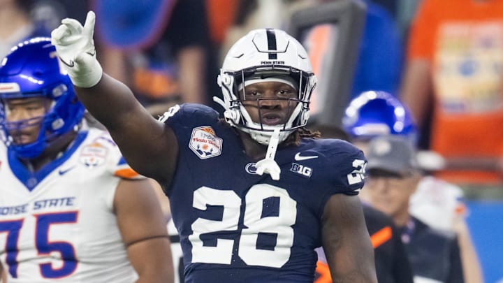 Dec 31, 2024; Glendale, AZ, USA; Penn State Nittany Lions defensive tackle Zane Durant (28) celebrates a play against the Boise State Broncos during the Fiesta Bowl at State Farm Stadium. Mandatory Credit: Mark J. Rebilas-Imagn Images