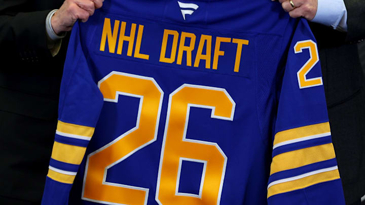 Jan 12, 2026; Buffalo, New York, USA;  NHL Commissioner Gary Bettman and Buffalo Sabres owner Terry Pegula pose for a photo during a press conference announcing the 2026 NHL Draft taking place in Buffalo at KeyBank Center. Mandatory Credit: Timothy T. Ludwig-Imagn Images