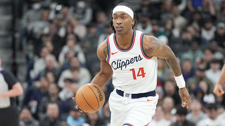 Jan 29, 2025; San Antonio, Texas, USA;  LA Clippers guard Terance Mann (14) dribbles up the court in the first half against the San Antonio Spurs at Frost Bank Center. Mandatory Credit: Daniel Dunn-Imagn Images