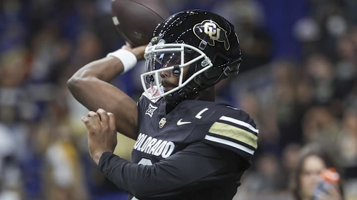 Dec 28, 2024; San Antonio, TX, USA; Colorado Buffaloes quarterback Shedeur Sanders (2) warms up before the game against the Brigham Young Cougars at Alamodome. Mandatory Credit: Troy Taormina-Imagn Images