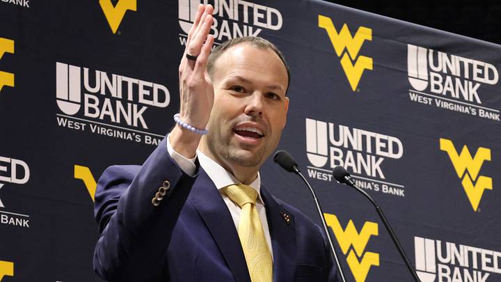 West Virginia University Vice President and Director of Athletics Wren Baker West Virginia University Vice President and Director of Athletics Wren Baker