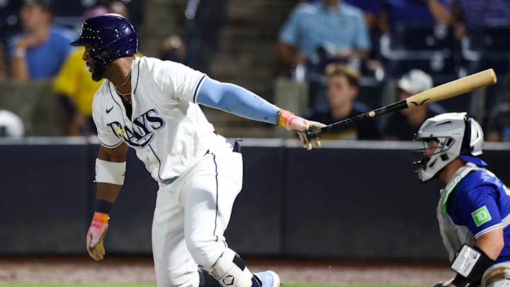 Sep 17, 2025; Tampa, Florida, USA; Tampa Bay Rays designated hitter Yandy Diaz (2) hits an rbi single against the Toronto Blue Jays in the first inning at George M. Steinbrenner Field. Sep 17, 2025; Tampa, Florida, USA; Tampa Bay Rays designated hitter Yandy Diaz (2) hits an rbi single against the Toronto Blue Jays in the first inning at George M. Steinbrenner Field.
