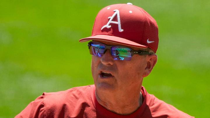 Arkansas head coach Dave Van Horn meets with umpires before the game at Sewell-Thomas Stadium in game 3 of the weekend series between Alabama and Arkansas.