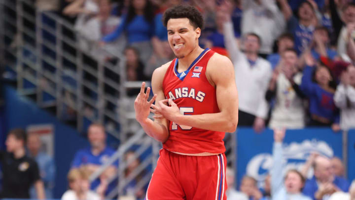 Kansas graduate senior guard Kevin McCullar Jr. (15) reacts after sinking a three against Kansas State in the first half of the Sunflower Showdown inside Allen Fieldhouse Tuesday, March 5, 2024.