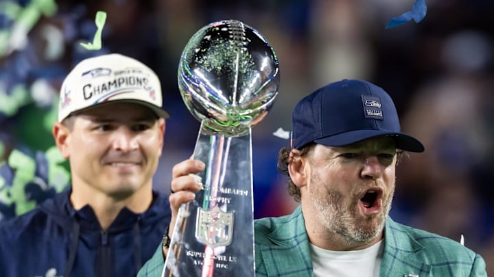 Seattle Seahawks general manager John Schneider celebrates with the Vince Lombardi trophy