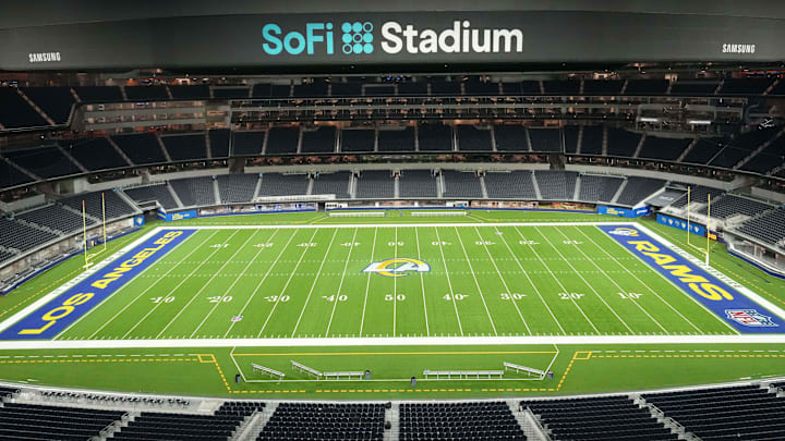 Nov 11, 2024; Inglewood, California, USA; A general overall viwe of an empty SoFi Stadium with Los Angeles Rams logo at midfield. Mandatory Credit: Kirby Lee-Imagn Images