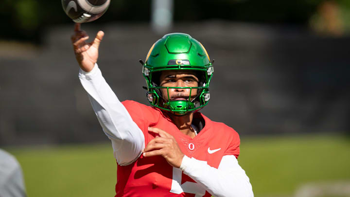 Oregon Ducks quarterback Dante Moore during practice in Eugene. Oregon Ducks quarterback Dante Moore during practice in Eugene.
