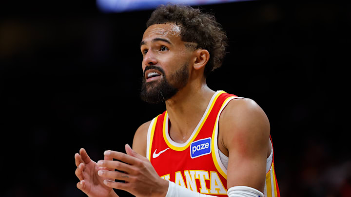 Hawks guard Trae Young reacts during game against the Raptors. 