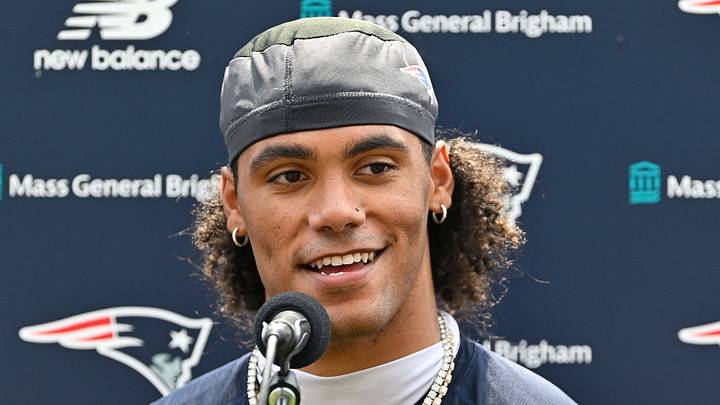 New England Patriots cornerback Christian Gonzalez (0) speaks to the media after practice at training camp New England Patriots cornerback Christian Gonzalez (0) speaks to the media after practice at training camp