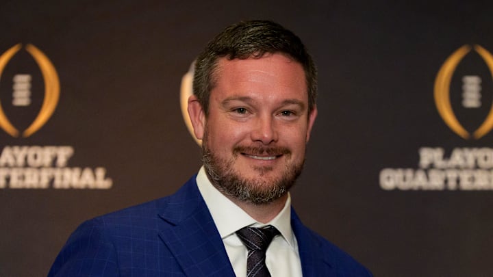 Oregon head coach Dan Lanning holds an orange during the head coaches press conference ahead of Orange Bowl on Dec. 31, 2025, in Dania Beach, Florida.