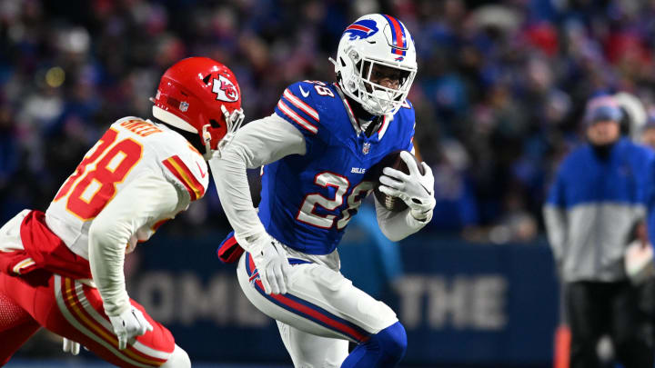 Jan 21, 2024; Orchard Park, New York, USA; Buffalo Bills running back Latavius Murray (28) rushes the ball against Kansas City Chiefs cornerback L'Jarius Sneed (38)in the first half of the 2024 AFC divisional round game at Highmark Stadium. Mandatory Credit: Mark Konezny-USA TODAY Sports Jan 21, 2024; Orchard Park, New York, USA; Buffalo Bills running back Latavius Murray (28) rushes the ball against Kansas City Chiefs cornerback L'Jarius Sneed (38)in the first half of the 2024 AFC divisional round game at Highmark Stadium. Mandatory Credit: Mark Konezny-USA TODAY Sports