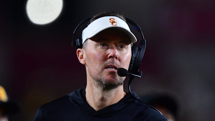 Nov 7, 2025; Los Angeles, California, USA; Southern California Trojans head coach Lincoln Riley watches game action against the Northwestern Wildcats during the second half at the Los Angeles Memorial Coliseum. Mandatory Credit: Gary A. Vasquez-Imagn Images Nov 7, 2025; Los Angeles, California, USA; Southern California Trojans head coach Lincoln Riley watches game action against the Northwestern Wildcats during the second half at the Los Angeles Memorial Coliseum. Mandatory Credit: Gary A. Vasquez-Imagn Images
