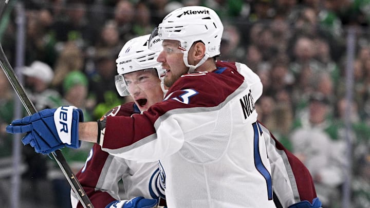 Mar 6, 2026; Dallas, Texas, USA; Colorado Avalanche defenseman Cale Makar (8) and right wing Valeri Nichushkin (13) celebrate the game tying goal scored by Nichushkin against the Dallas Stars during the third period at the American Airlines Center. Mandatory Credit: Jerome Miron-Imagn Images